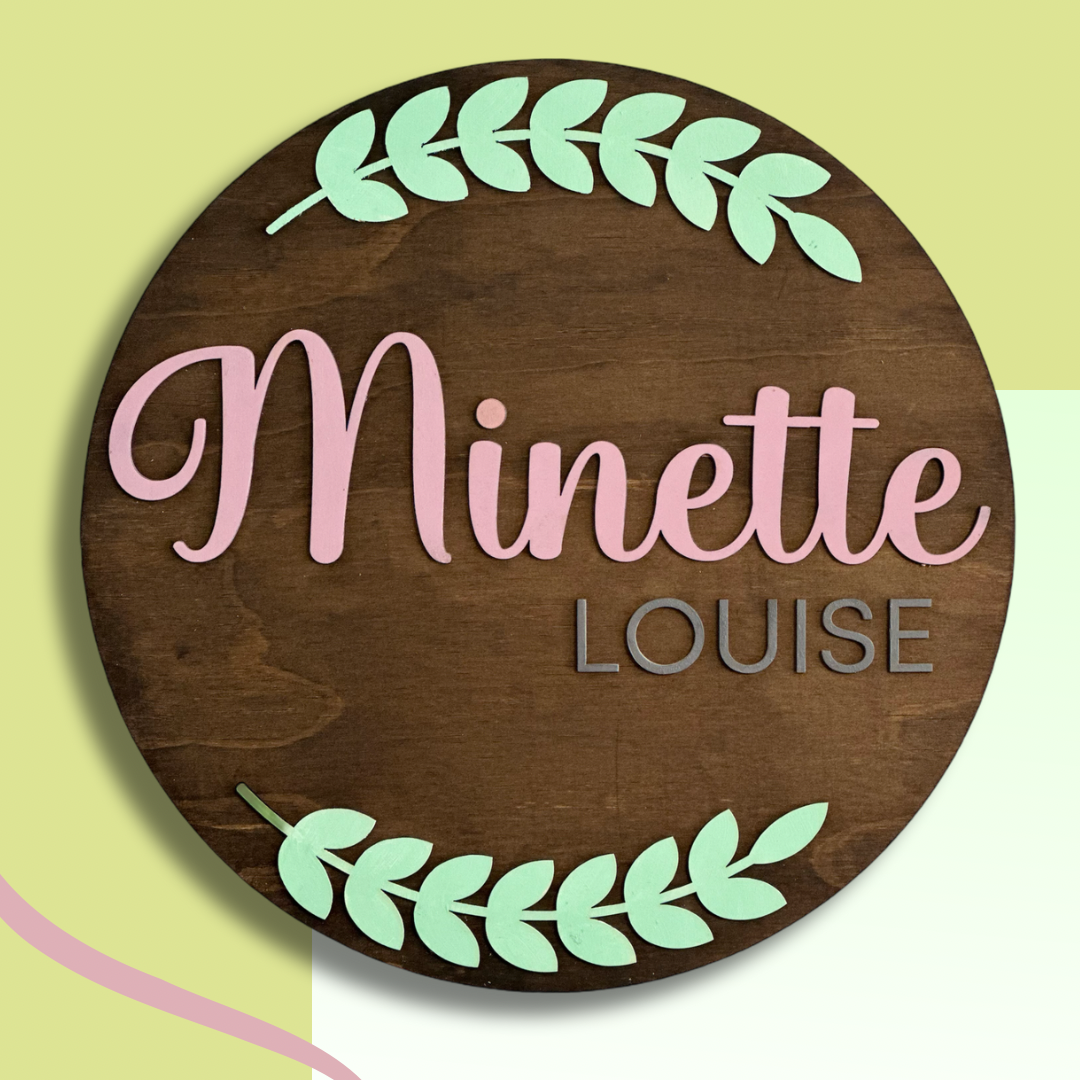 Personalized round wood sign for baby’s nursery/kid’s room with first+middle name and wreath