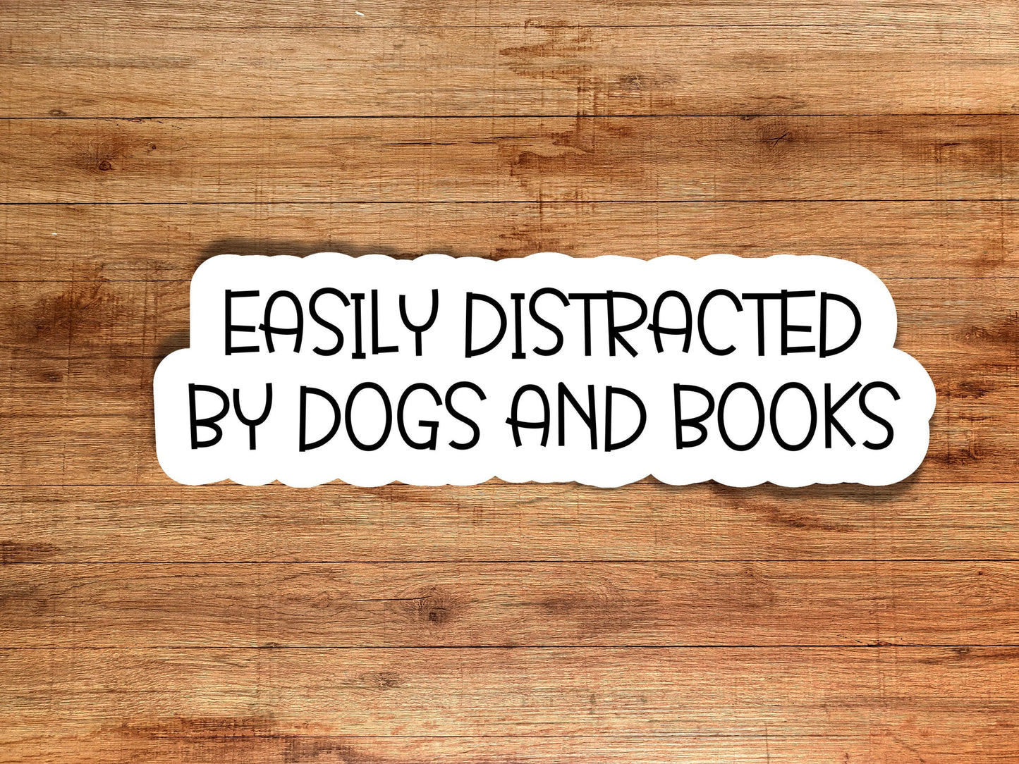 Easily distracted by dogs and books | glossy sticker | laptop sticker | dog lovers sticker | book lovers sticker